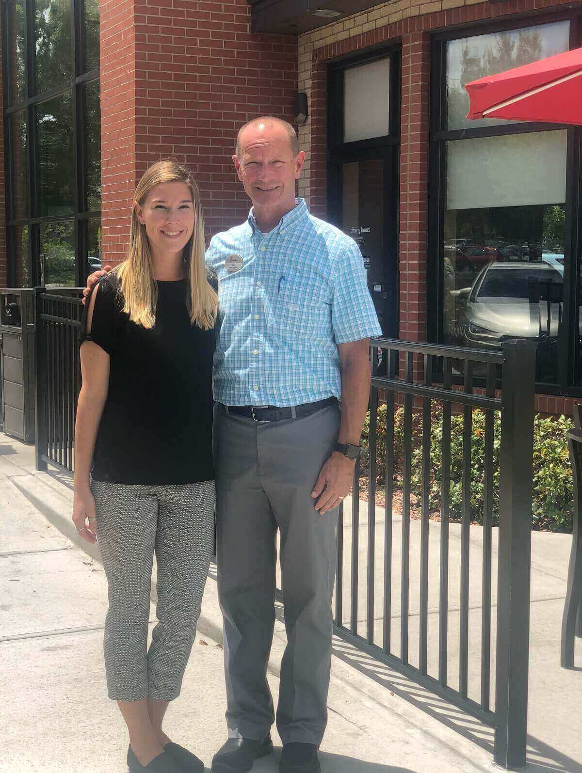 Father and daughter Glen and Olivia Efford standing outside of Chick-fil-A