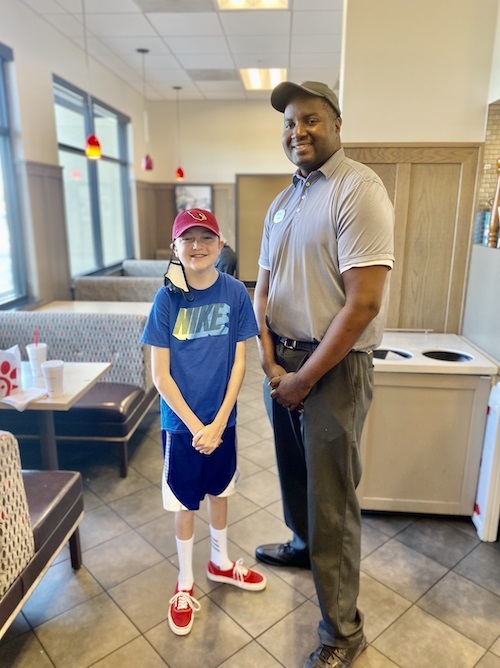 Brian Middletonand Shae Veach in a Chick-fil-A restaurant