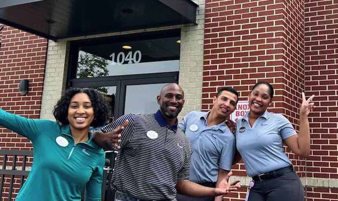 Marlon Terrell and three team members outside of Chick-fil-A.