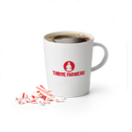 A Peppermint Coffee, in a mug with candy cane pieces.