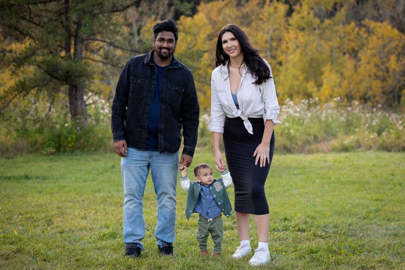 Karleen Rhodes with her husband and child.
