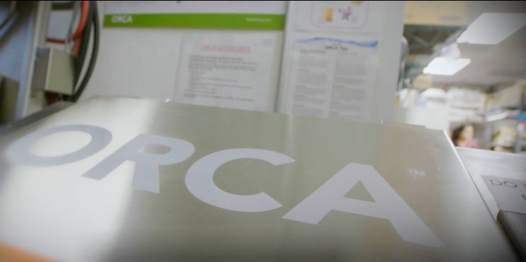 Close-up of an ORCA aerobic digester with a stainless steel surface.