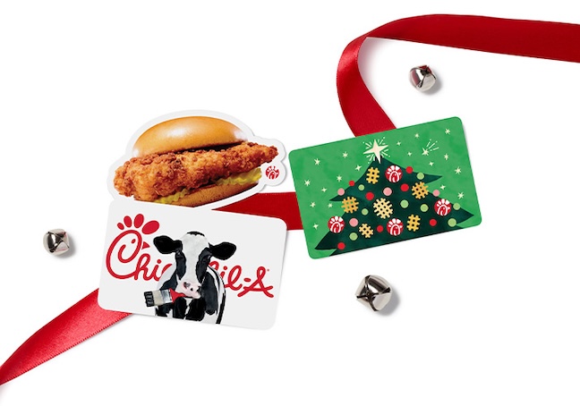 Chick-fil-A Cow gift card, Chicken Sandwich gift card and green Christmas tree gift card on a white background with a red ribbon and bells 