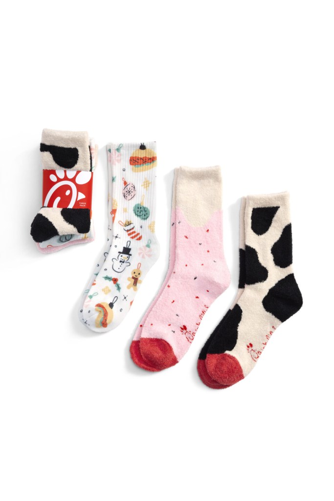 Three different designs of Chick-fil-A Holiday Socks.