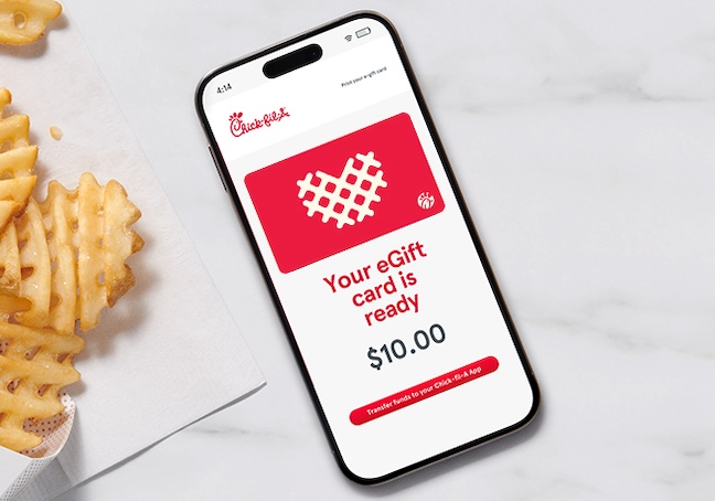 Smartphone displaying a $10.00 eGift card next to waffle fries on a marble surface.