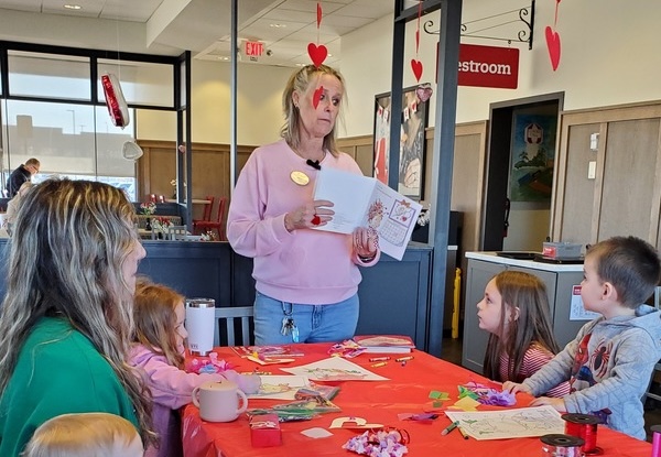 Children sitting at a Craft Table in a Chick-fil-A restaurant