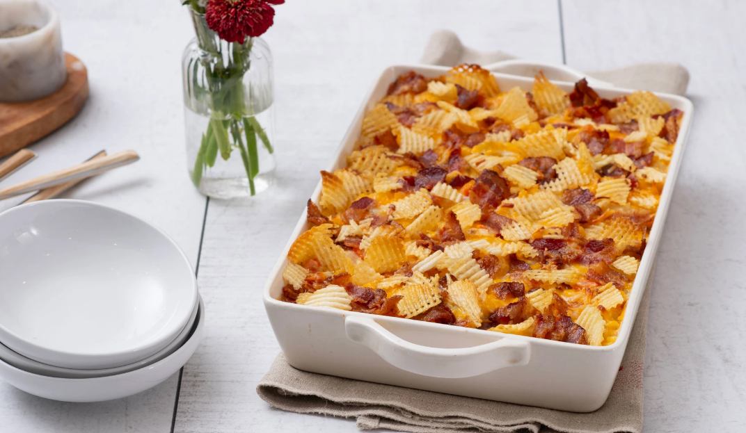 Casserole with cheese, bacon and potatoes