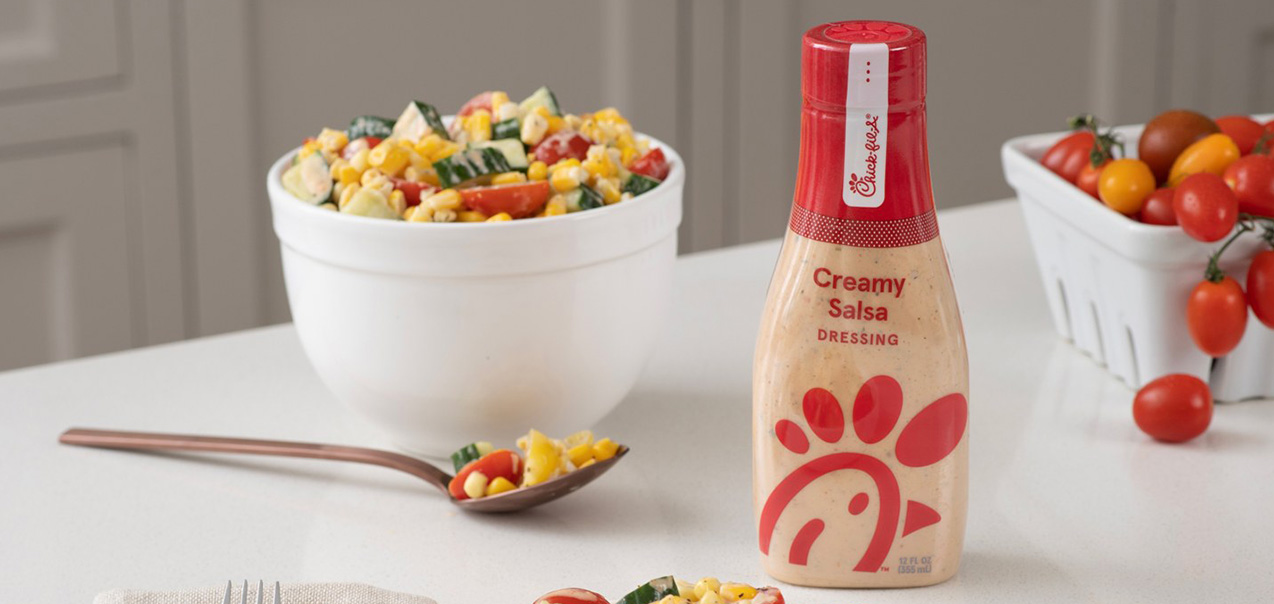 Creamy Salsa Corn Salad next to a bottle of Chick-fil-A Creamy Salsa Dressing