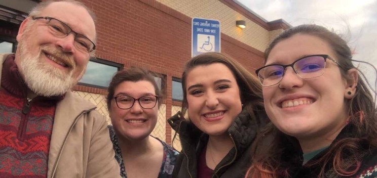 Family posing for a selfie