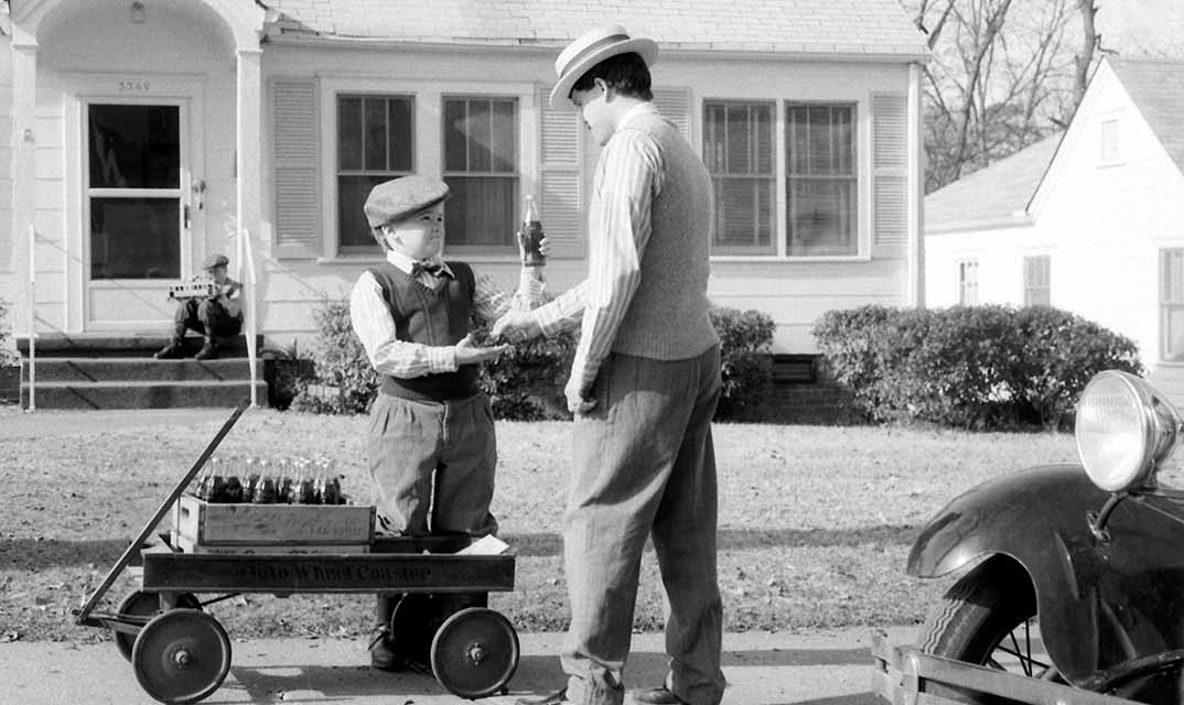 Young Truett Cathy selling bottles of Coca-Colas from his wagon
