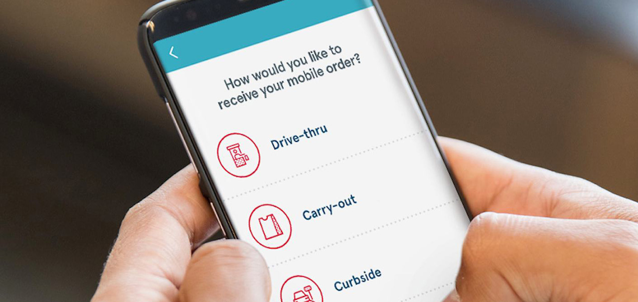 Smartphone screen displaying a mobile ordering app with options for Drive-thru, Carry-out, and Curbside.