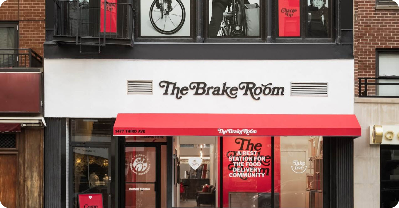 Outside, the front of The Brake Room by Chick-fil-A in Manhattan.