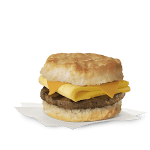 Sausage, egg and cheese on a biscuit on white paper napkins