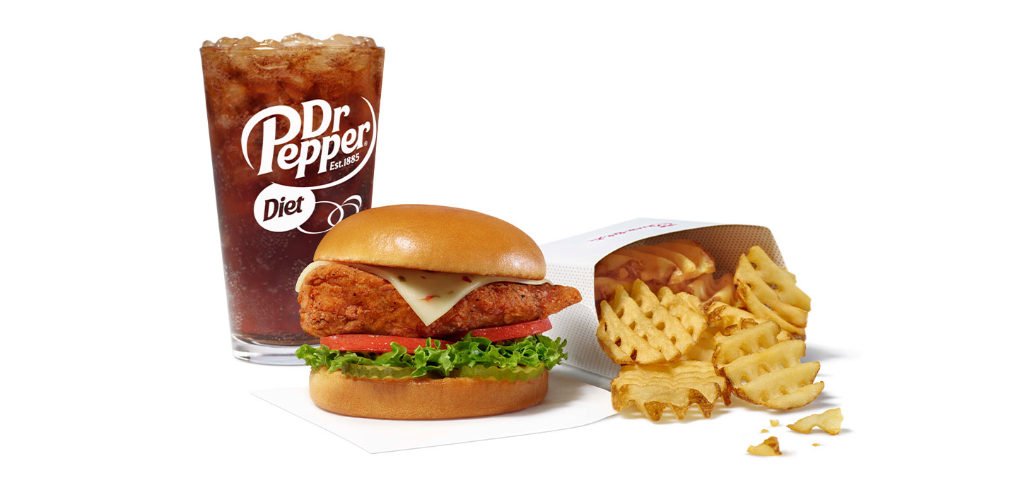 Chick-fil-A Spicy Deluxe Chicken sandwich with a Diet Dr Pepper and waffle fries
