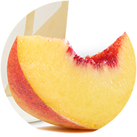 Closeup of a slice of peach.
