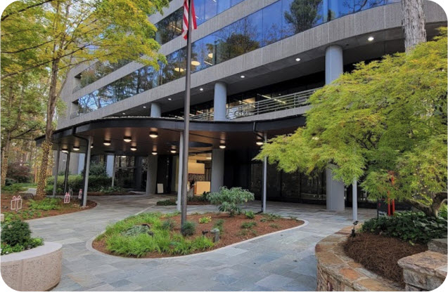 Exterior view of the Chick-fil-A Support Center in Georgia with modern architecture and landscaped surroundings.