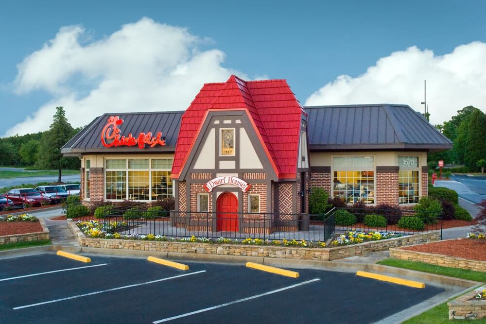 Restaurant with a "Dwarf House" entry and red, triangular roof, featuring the "Chick-fil-A" logo.