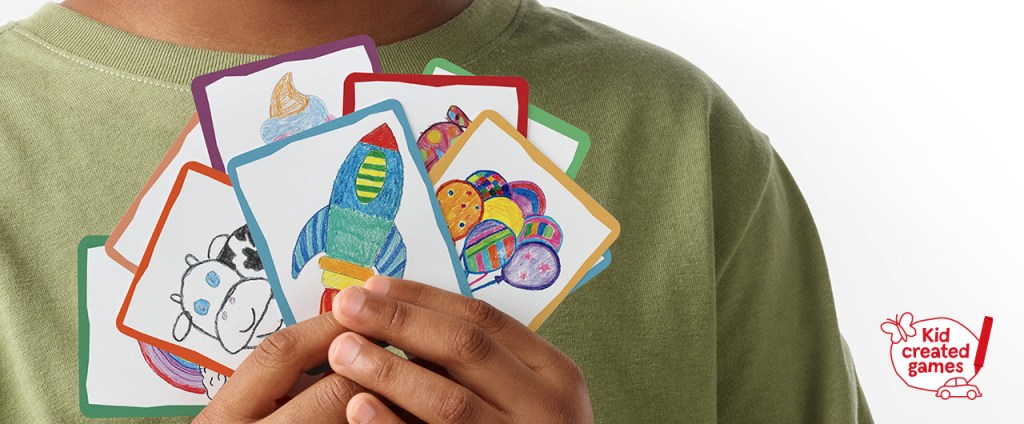A child holding game cards.