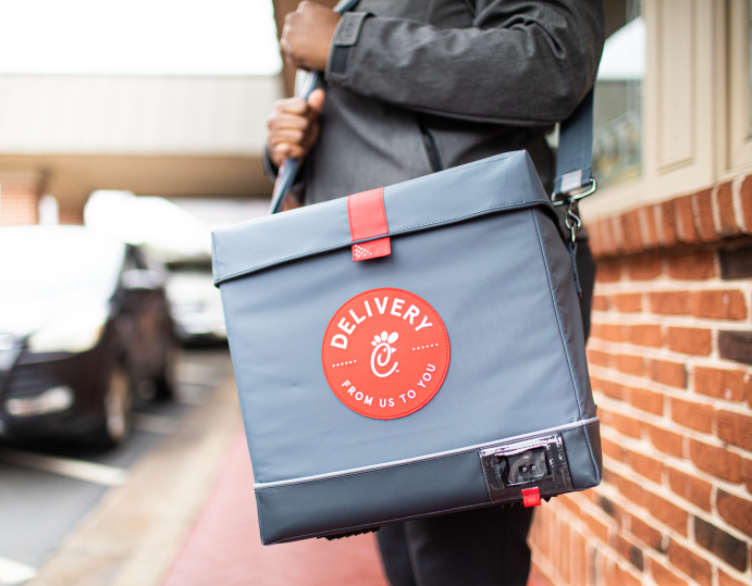 Food Delivery person with a Chick-fil-A branded bag