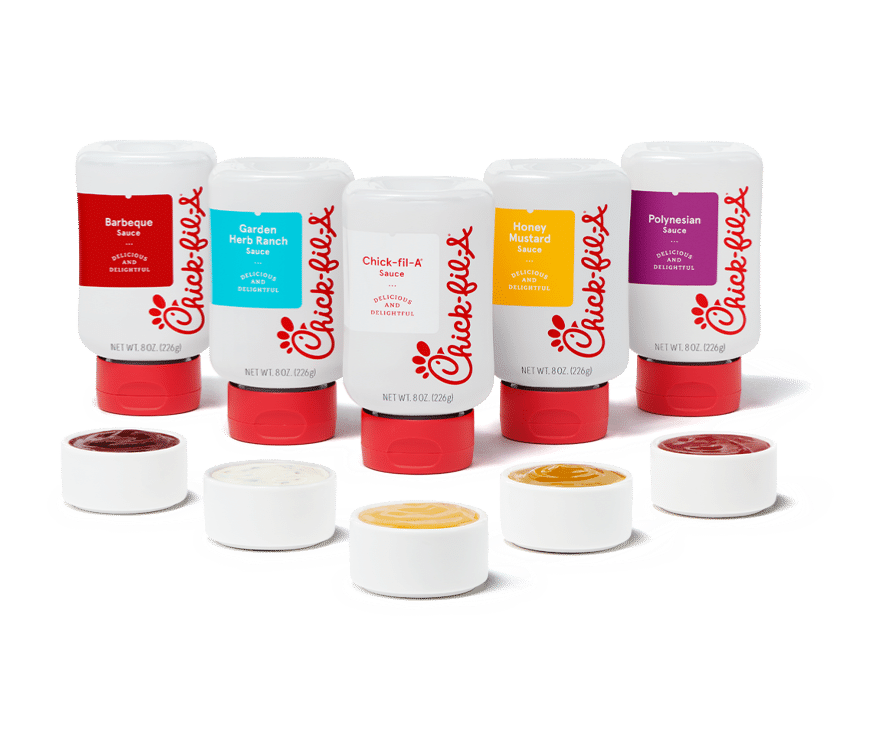 Five Chick-fil-A sauce bottles with corresponding small sauce containers in front:
Barbeque Sauce Delicious and Delightful Net Wt. 8 oz (226g),
Garden Herb Ranch Sauce Delicious and Delightful Net Wt. 8 oz (226g),
Chick-fil-A Sauce Delicious and Delightful Net Wt. 8 oz (226g),
Honey Mustard Sauce Delicious and Delightful Net Wt. 8 oz (226g), and
Polynesian Sauce Delicious and Delightful Net Wt. 8 oz (226g).