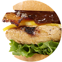 Closeup view of Grilled Smokehouse BBQ Bacon Sandwich.