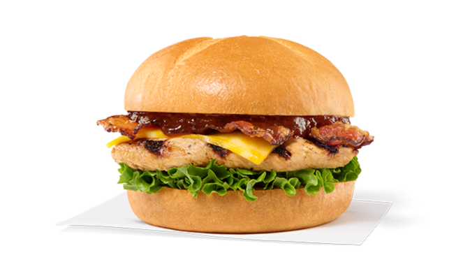 Grilled Smokehouse BBQ Bacon Sandwich with grilled chicken, bacon, cheese, lettuce, and barbecue sauce on a bun.