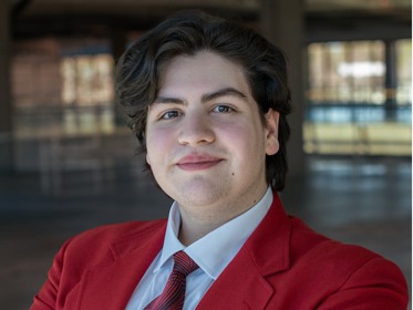 Headshot of Jeffhan with a blurred indoor background.