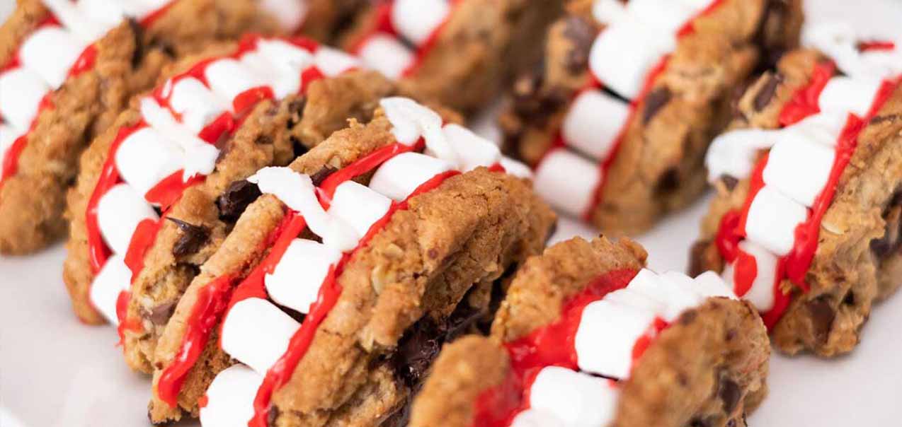 "Vampire" cookies decorated with marshmallow “teeth" and white icing "fangs"