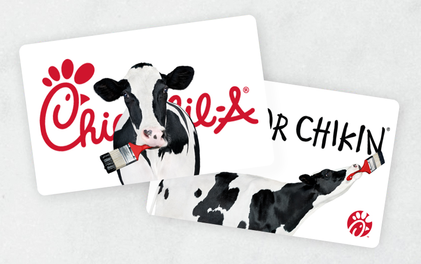 Two gift crds with different designs, featuring the Chick-fil-A cows.