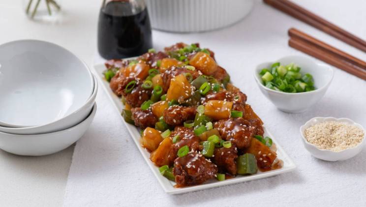 A sweet and sour chicken meal made with Chick-fil-A® Nuggets