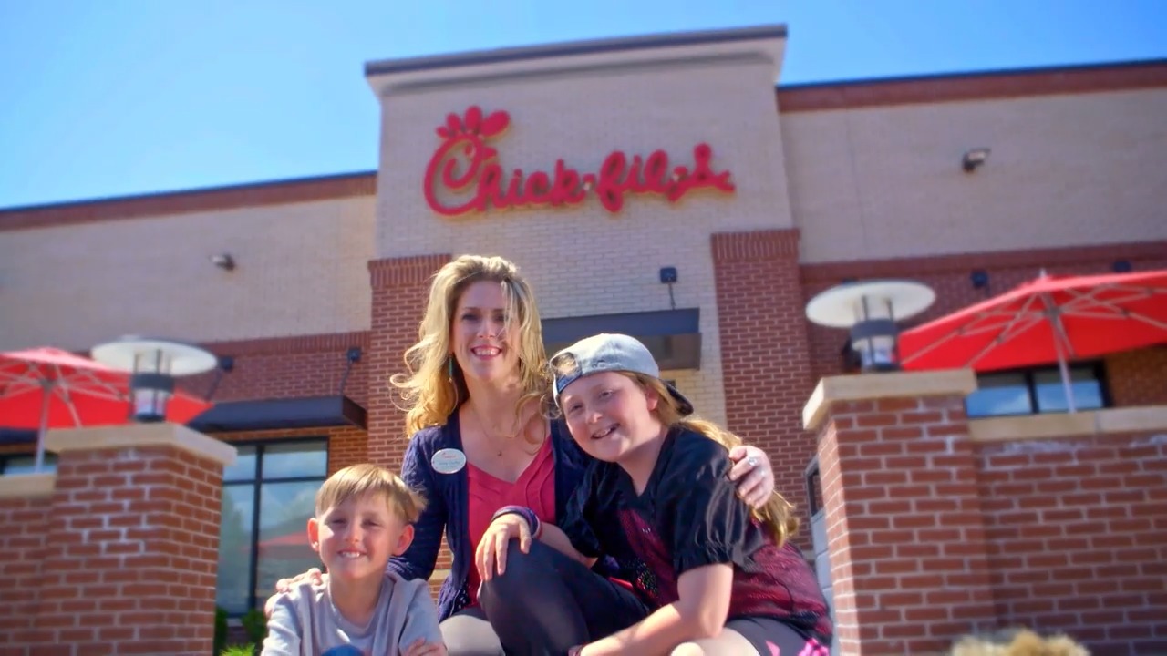 Holly Curby and her children outside of Chick-fil-A restaurant.