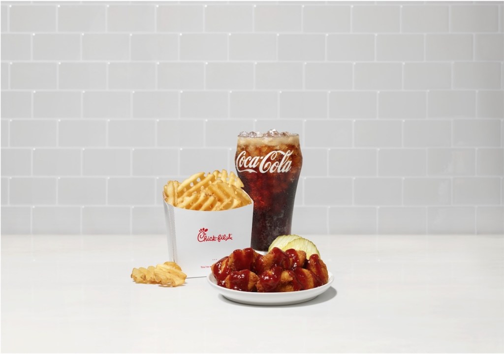 Smokehouse BBQ Nuggets with waffle fries and a drink.