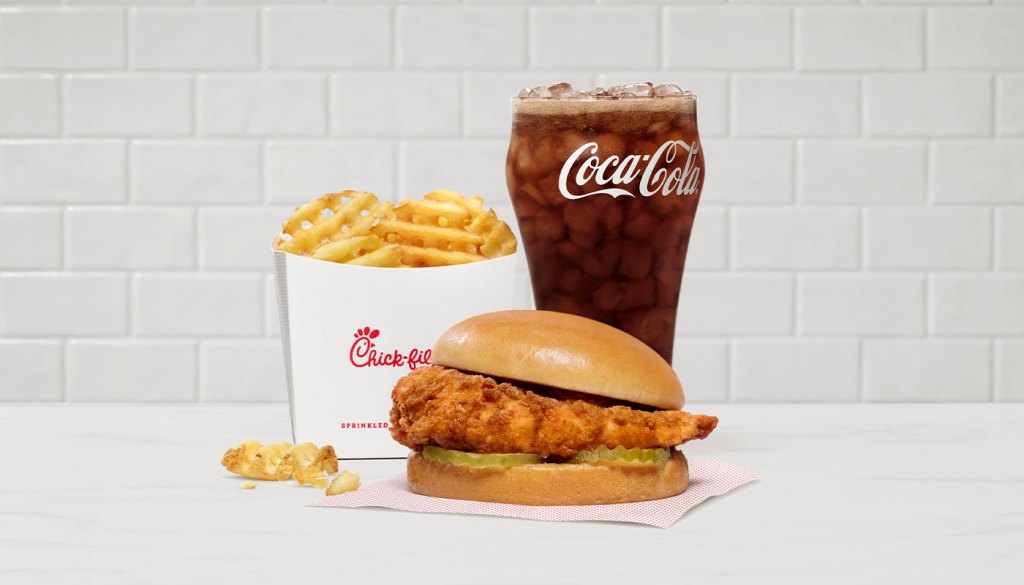 Chick-fil-A Original Chicken sandwich as a meal with waffle fries and a drink.
