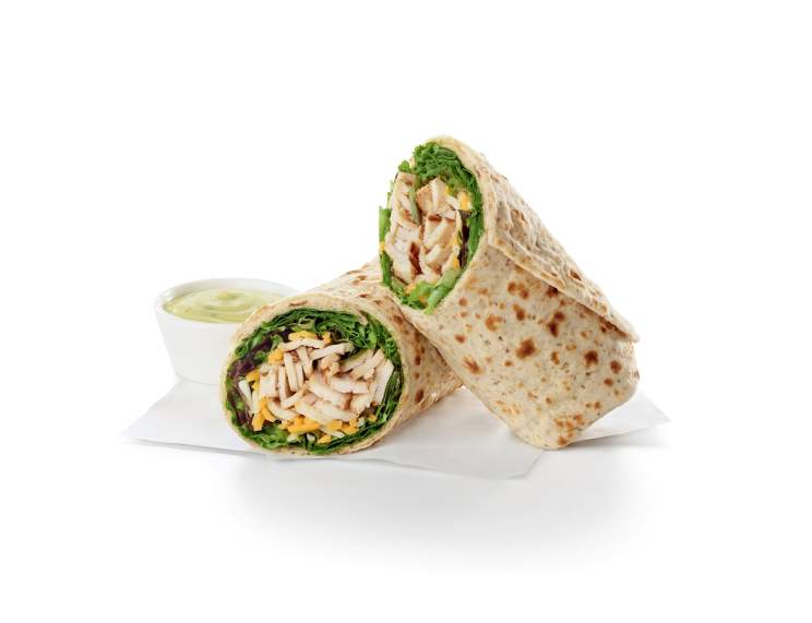 Sliced grilled chicken breast with a mix of green leaf lettuce with a blend of shredded Monterey Jack and Cheddar cheeses, rolled in a flaxseed flour flat bread.