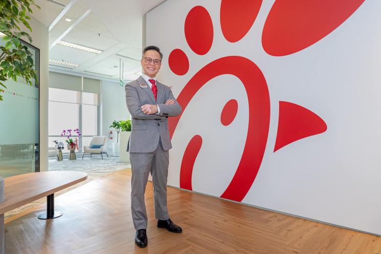 Portrait of Chyn Koh, the first Local Owner-Operator of Chick-fil-A in Singapore.