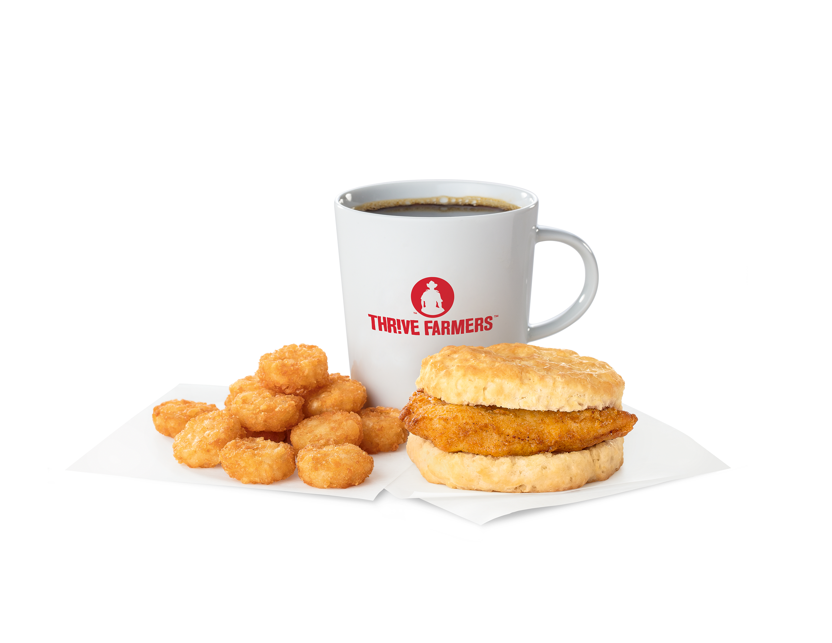 Chick-fil-A® Chicken Biscuit, Hash Browns and a cup of coffee in a Thrive Farmers branded mug.