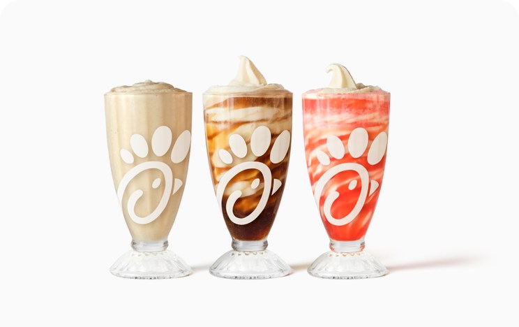Glasses of Frosted Coca-Cola® Soda, a Coca-Cola® Float and Hi-C® Fruit Punch Float