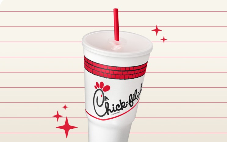 1967 Classic Cup with red stars around it on a cream striped background