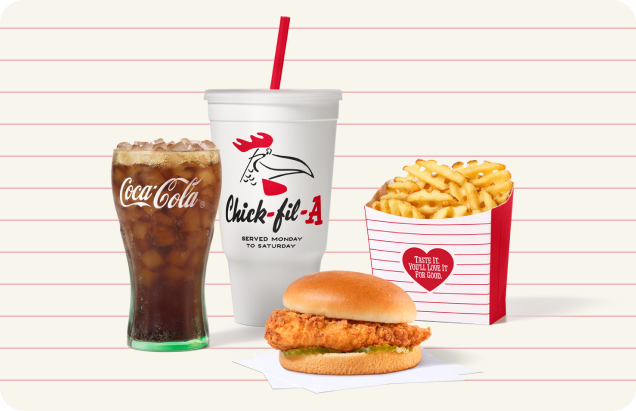Chick-fil-A® Chicken Sandwich with Waffle Fries, a glass of Coca-Cola® and a Doodles Classic Cup