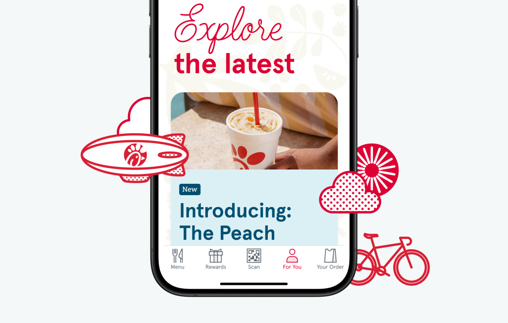 A smartphone showing the For You section of the Chick-fil-A® App with red illustrations of a blimp, clouds, and a bicycle around it