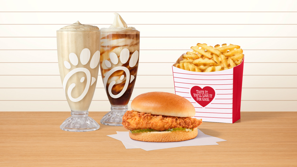 Chick-fil-A Chicken Sandwich featured with Waffle Fries, a Frosted Soda and Float.
