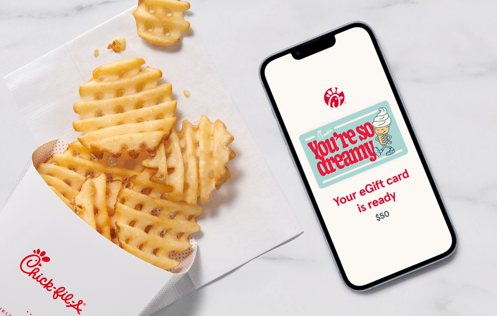 A smartphone with a Chick-fil-A eGift card on it with “You’re so dreamy” on it with an Icedream® carton on it  