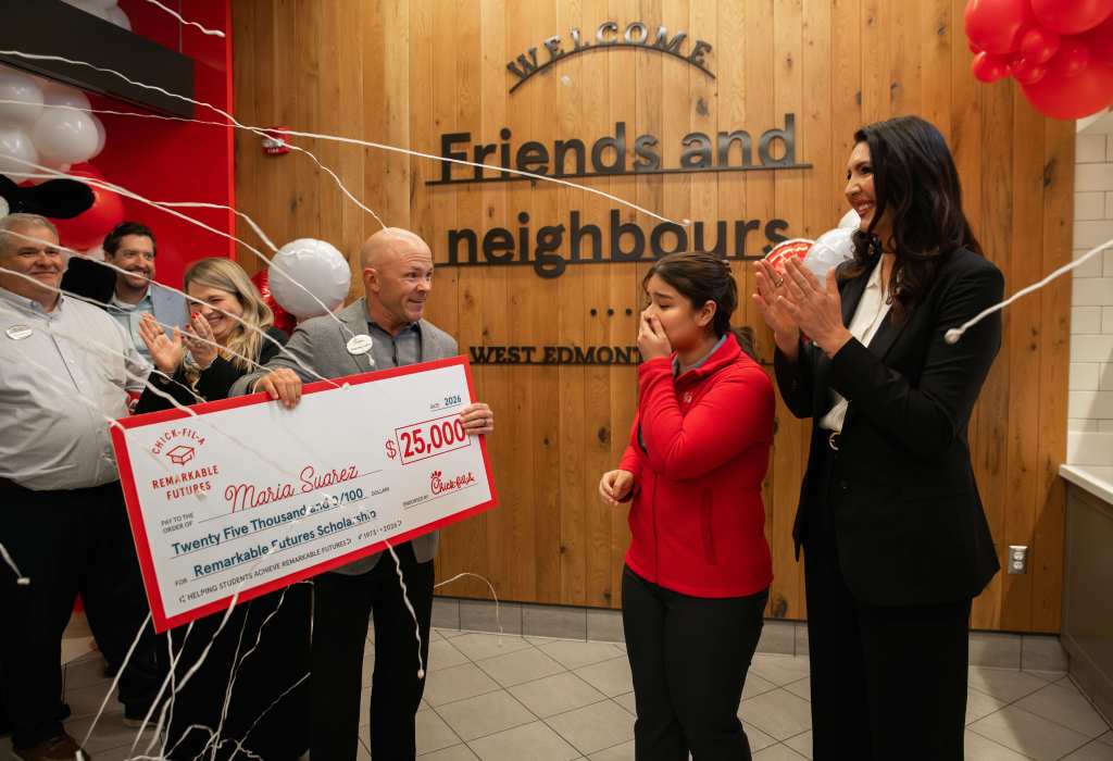 Chick-fil-A Team Member Maria Suarez celebrates receiving her $25K Remarkable Futures Scholarships and celebrating with her fellow Team Members.