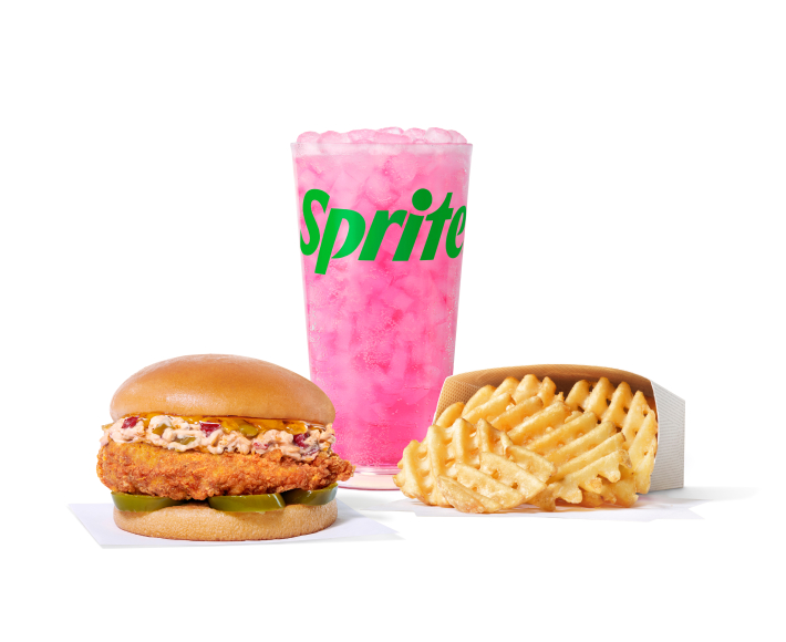 Honey Pepper Pimento Sandwich with an original fillet, a side of Waffle Fries and a glass of Pineapple Dragonfruit & Sprite®