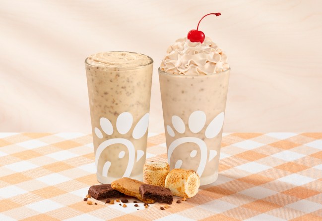 S’mores Frosted Coffee and S’mores Milkshake with toasted marshmallows and chocolate shortbread & graham cracker crumbles on a brown checkered tablecloth